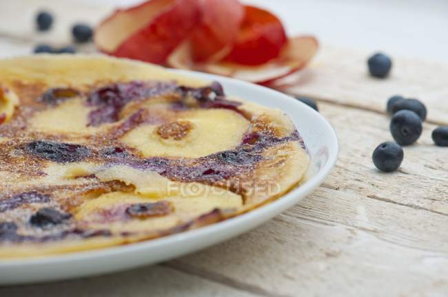 Apple and blueberry pancakes — Stock Photo