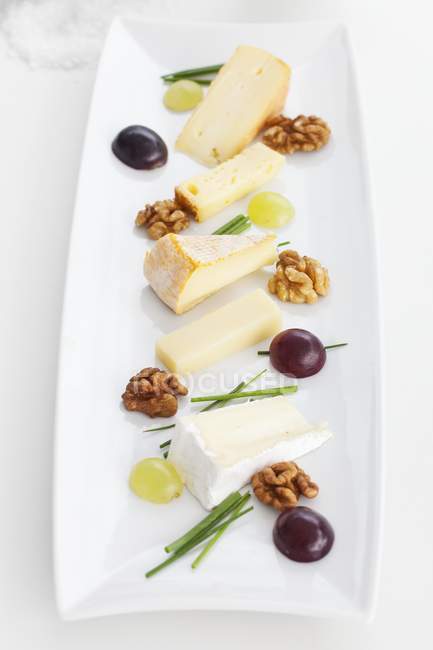 Plate of cheese specialities — Stock Photo