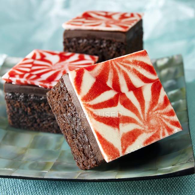 Chocolate peppermint brownies with colorful glaze — Stock Photo