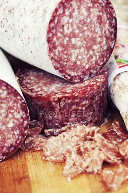 Pieces of italian salami — Stock Photo