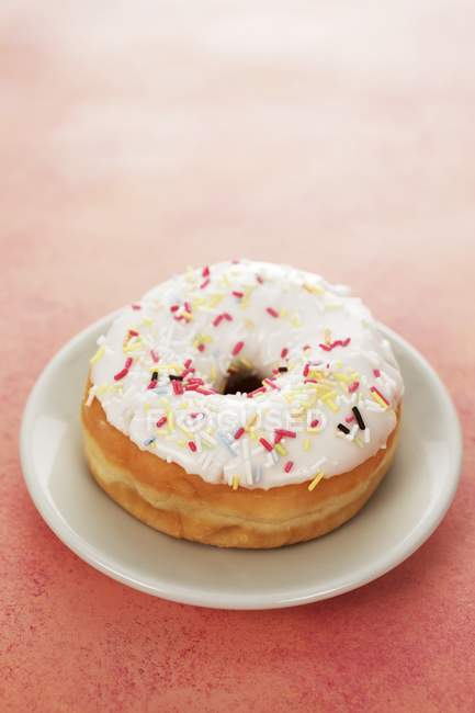 Doughnut with sugar sprinkles — Stock Photo