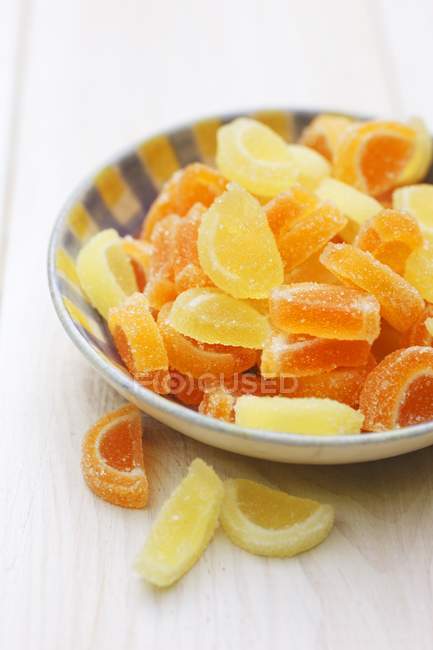 Closeup view of candied citrus fruit in bowl — Stock Photo