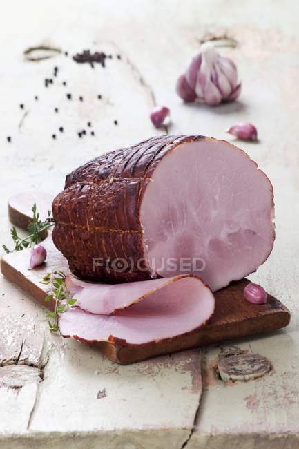 Partly sliced Smoked ham — Stock Photo