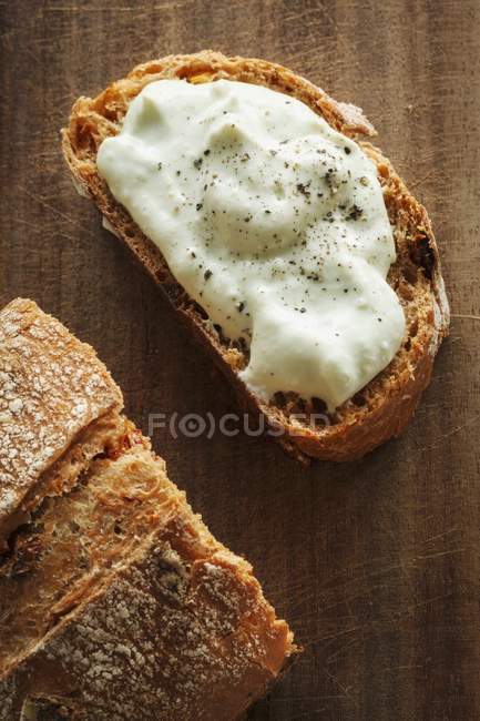 Bread spread with avocado — Stock Photo