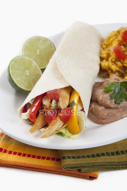 Chicken fajita with beans and rice — Stock Photo