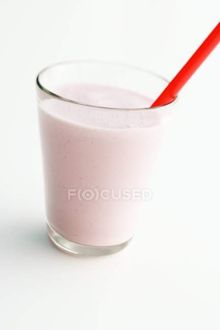 Strawberry Milkshake with a Straw — Stock Photo