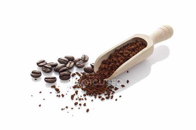 Coffee powder and beans — Stock Photo