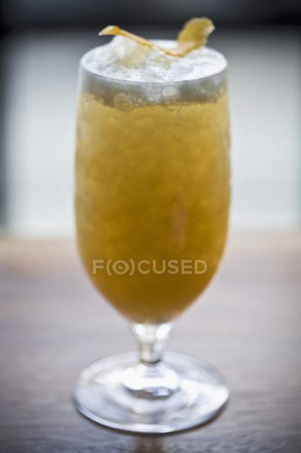 Cocktail on wooden surface — Stock Photo