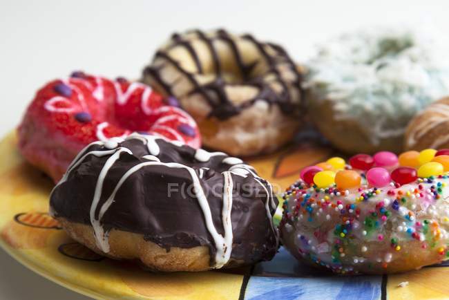 Assorted Frosted Doughnuts — Stock Photo