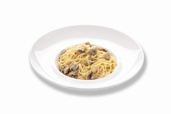 Спагетти с грибами — стоковое фото
