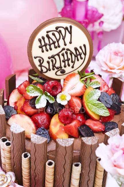 Chocolate cake with fruits for birthday — Stock Photo