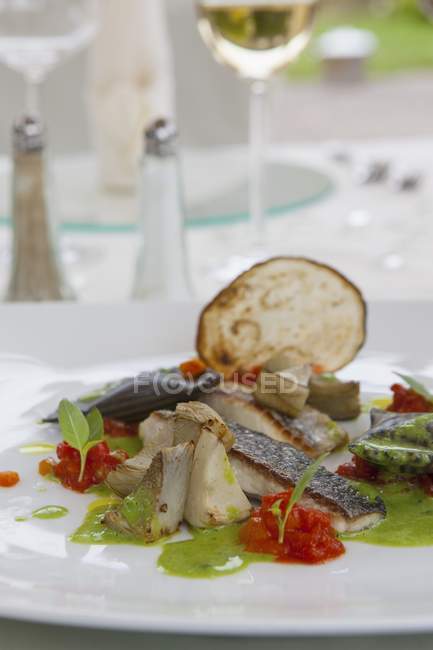 Bream with aubergine ravioli — Stock Photo