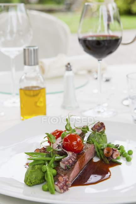 Saddle of veal with squid — Stock Photo