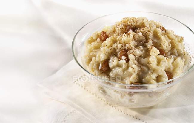 Glass bowl of rice pudding — Stock Photo