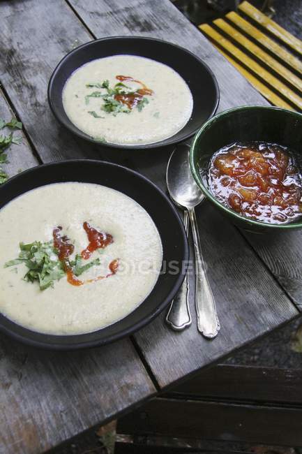 Cauliflower soup with mango chutney — Stock Photo