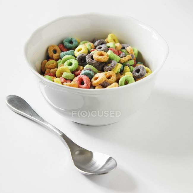 Bowl of fruity ring cereal — Stock Photo