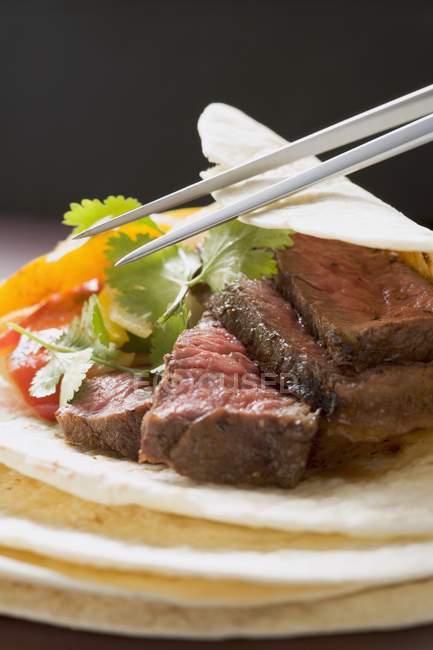 Tortilla with beef and pepper — Stock Photo