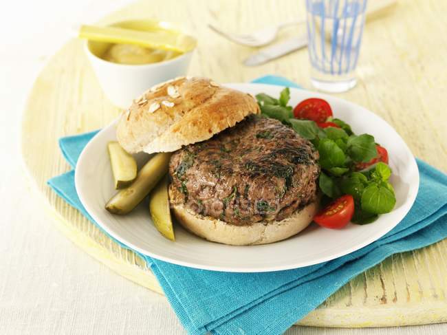 Burger with herbs and vegetables — Stock Photo