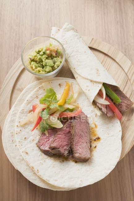 Wraps with beef and pepper filling — Stock Photo