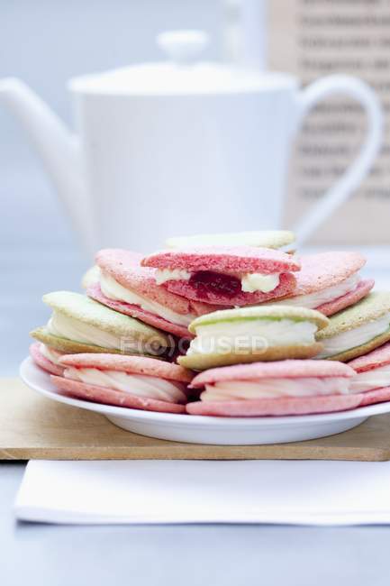 Various macaroons on plate — Stock Photo