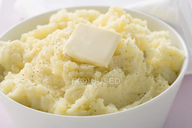 Purê de batata com botão de manteiga — Fotografia de Stock