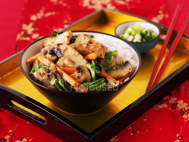 Closeup view of pork with mushrooms and herbs — Stock Photo