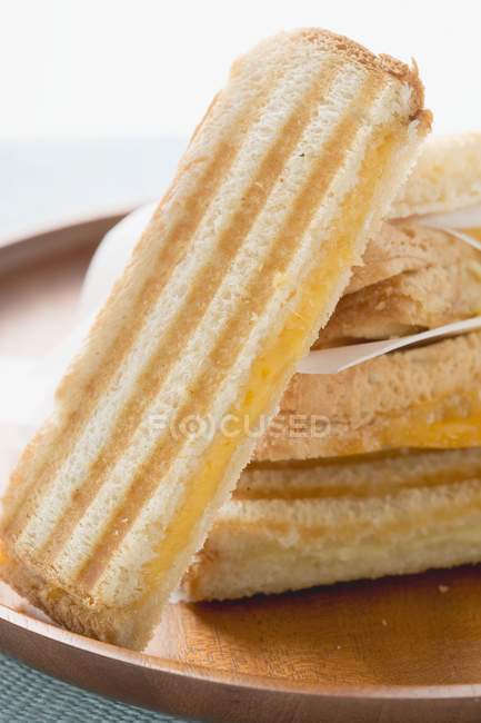 Cheese toasties on plate — Stock Photo