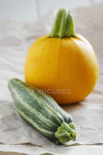 Round yellow and green stripy courgettes — Stock Photo