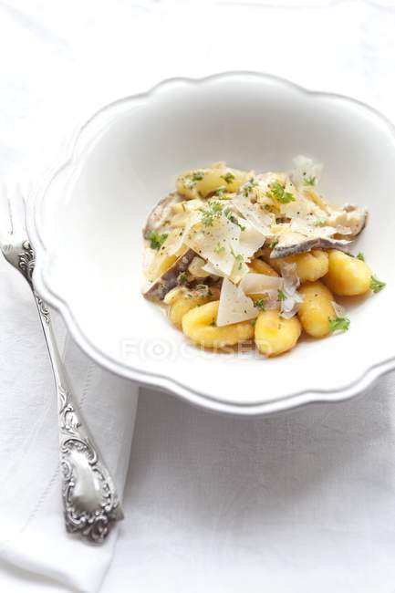 Gnocchi with Parmesan on plate — Stock Photo
