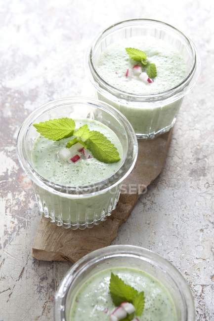 Cold cucumber soup in glasses — Stock Photo