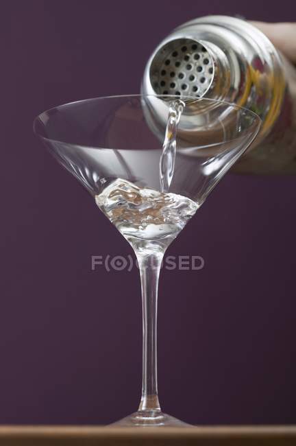 Pouring Martini out — Stock Photo