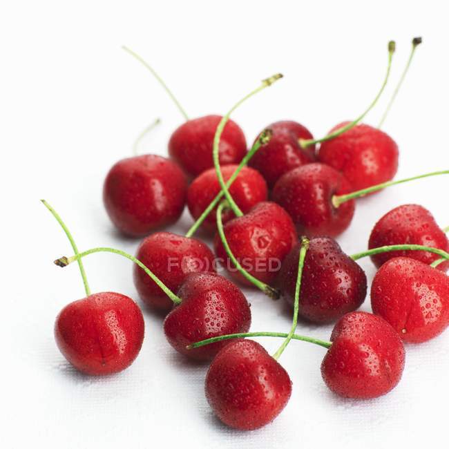 Red cherries with water droplets — Stock Photo