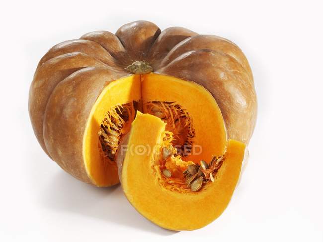 Fresh pumpkin with slice — Stock Photo