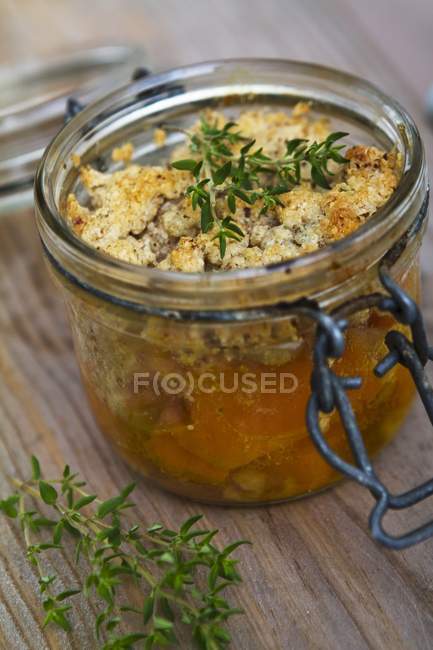 Closeup view of a jar of Rillette with herbs — Stock Photo