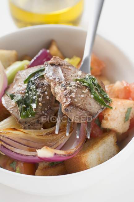 Bread salad with liver — Stock Photo