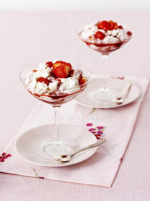Closeup view of Eton Mess with strawberries in glasses — Stock Photo