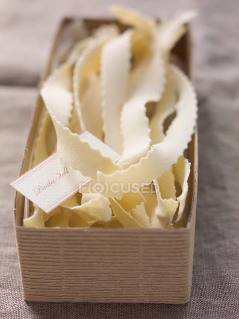 Raw riffled tagliatelle pasta — Stock Photo