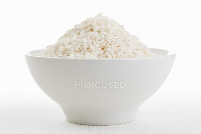 Risotto rice in bowl — Stock Photo