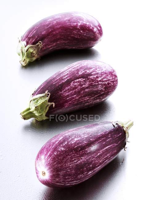 Fresh ripe aubergines — Stock Photo