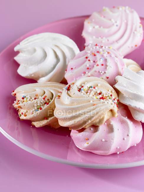 Meringues with coloured sprinkles — Stock Photo