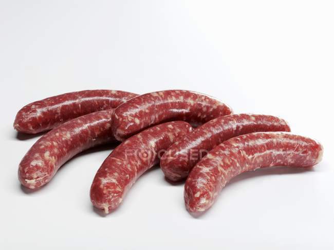 Raw Beef sausages — Stock Photo