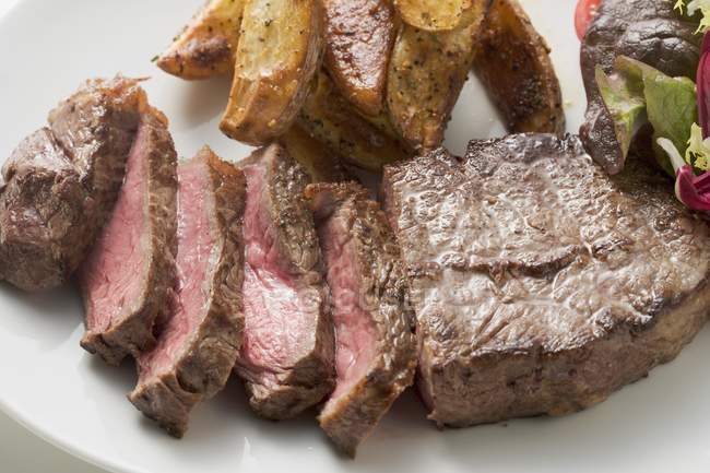 Beef steak with wedges — Stock Photo