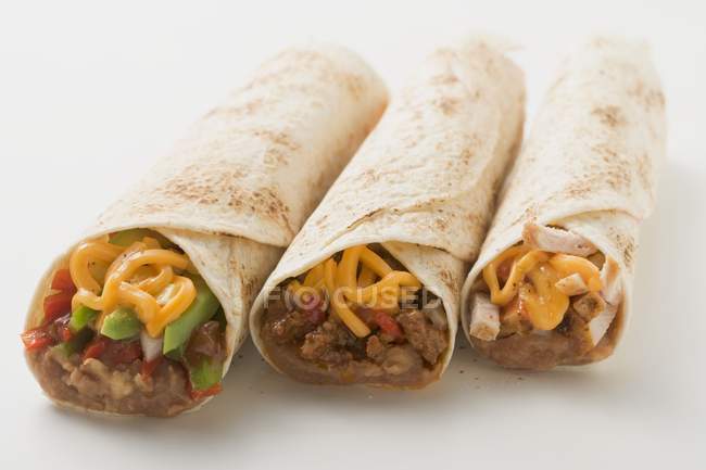 Três burritos diferentes — Fotografia de Stock