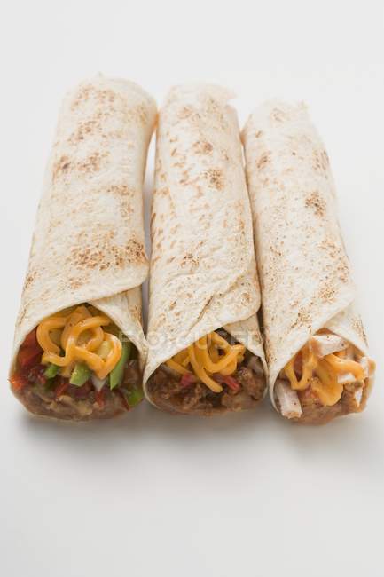 Three different burritos — Stock Photo