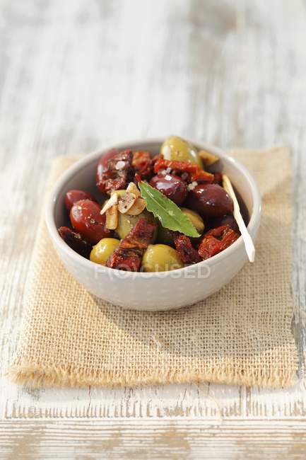 Marinated olives and dried tomatoes — Stock Photo