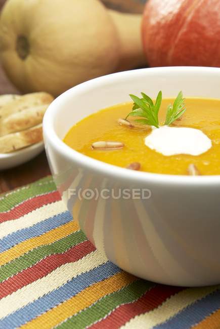 Pumpkin soup with cream — Stock Photo