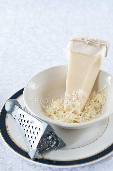 Parmesan partly grated — Stock Photo