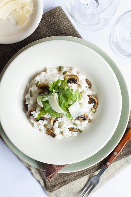Risotto with mushrooms and seeds — Stock Photo