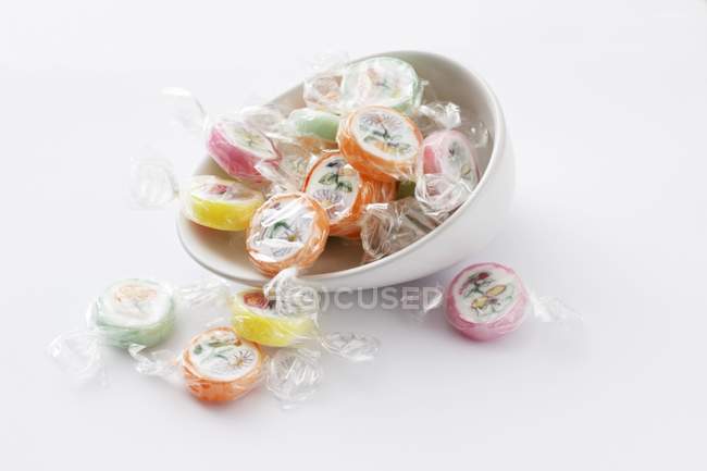 Closeup view of sugar bonbons in cellophane paper — Stock Photo