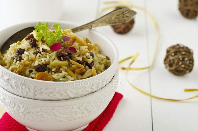 Spicy rose rice with almonds — Stock Photo